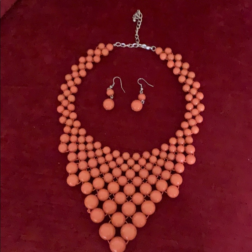 Orange beaded necklace and earrings